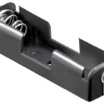 Suport 1x AA R6 cu urechi pentru lipire COMF BH-311-1D